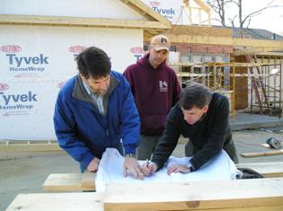 Peter McConaughy consulting wth clients on site.
